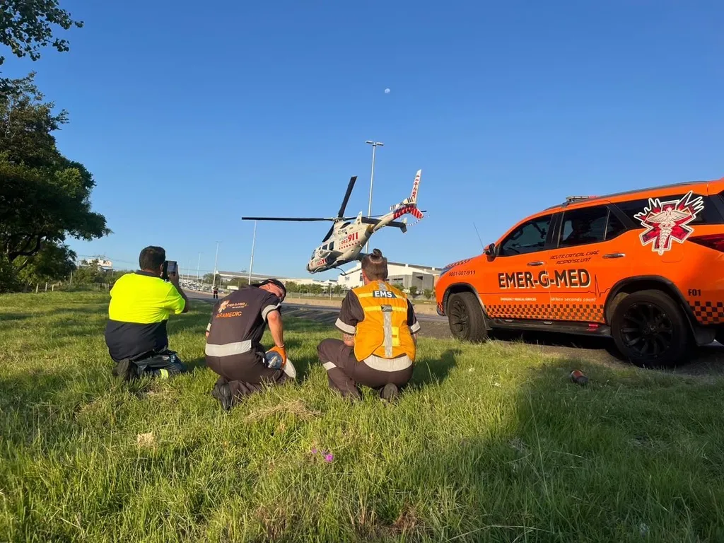Emer-G-Med rescue vehicle and helicopter